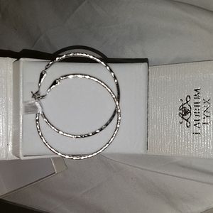 Women's sterling hoop earrings large and medium gold